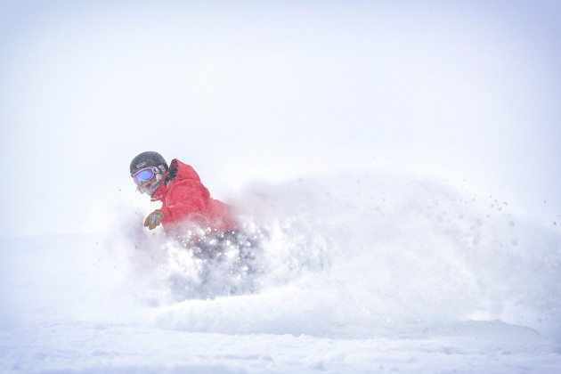 Snowboarding powder at Copper Mountain